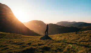 A person standing on a rock.